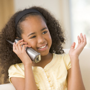 girl talking on telephone